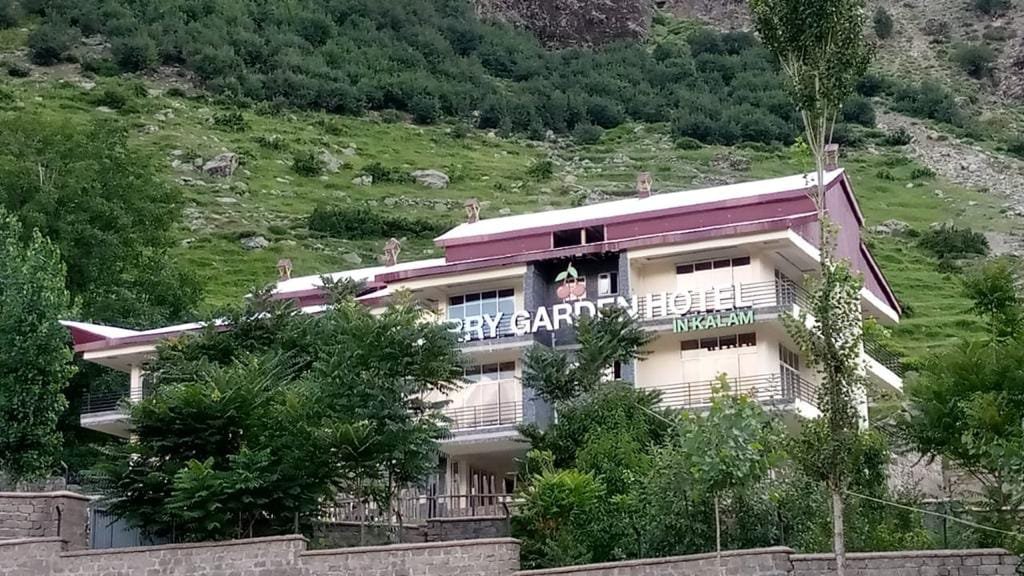 Cherry Garden Hotel Kalam exterior view with green hills, Swat Valley